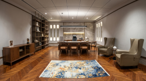 "Where boardroom precision meets residential comfort. 🌿 This executive lounge pairs rich walnut chevron floors with a signature sage leather Chesterfield, creating a space designed for high-level collaboration and quiet luxury."